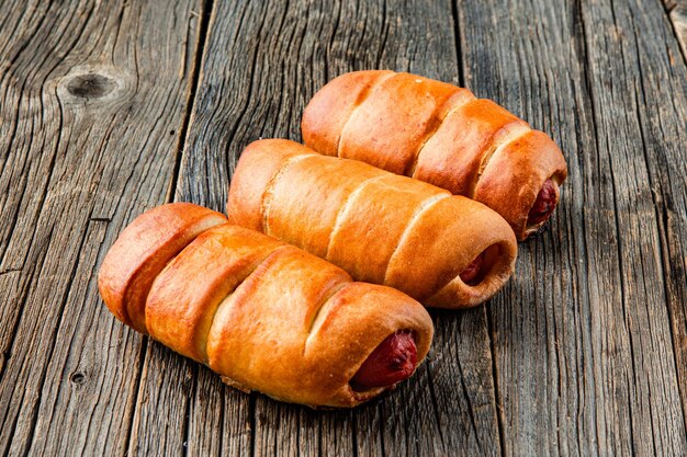 Varkens in een deken Hotdogs gewikkeld in een croissant