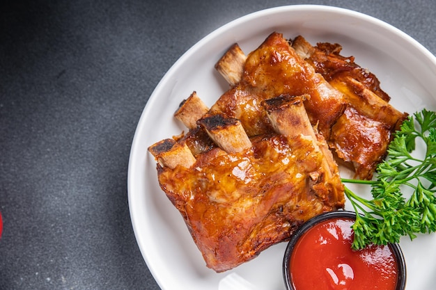 varkensribbetjes grill barbecue gebakken maaltijd eten snack op tafel kopieer ruimte voedsel achtergrond