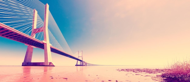 Vasco da Gama bridge over the Tagus river at sunset with sun and clouds.Lisbon,Portugal.