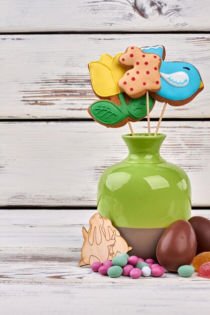 Vase and Easter sweets Wooden cutout rabbits Cute Easter present