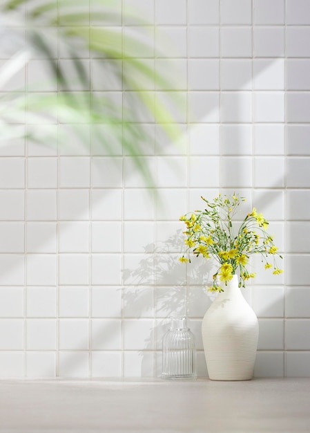 Vases and objects on the table in a warm room with sunlight coming in