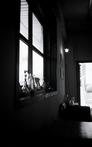 Photo vases on window sill