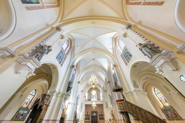 VASILISHKI BELARUS JUNE 2019 interior dome and looking up into a old gothic or baroque catholic church ceiling and vaulting