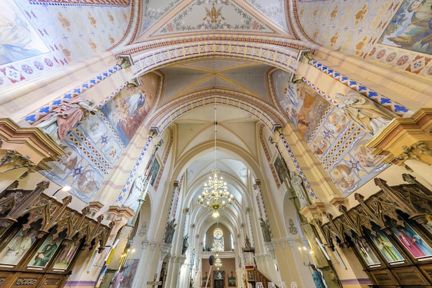 VASILISHKI BELARUS JUNE 2019 interior dome and looking up into a old gothic or baroque catholic church ceiling and vaulting