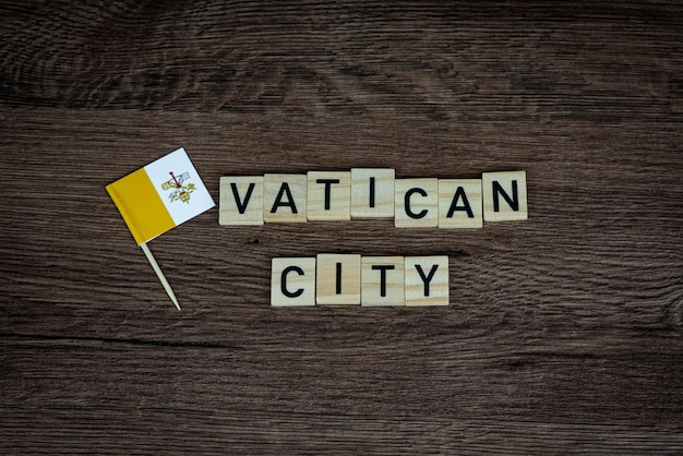 Vatican city - wooden word with vatican flag (wooden letters, wooden sign)