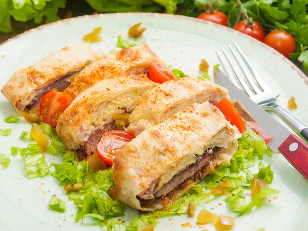 Veal baked in puff pastry with cheese