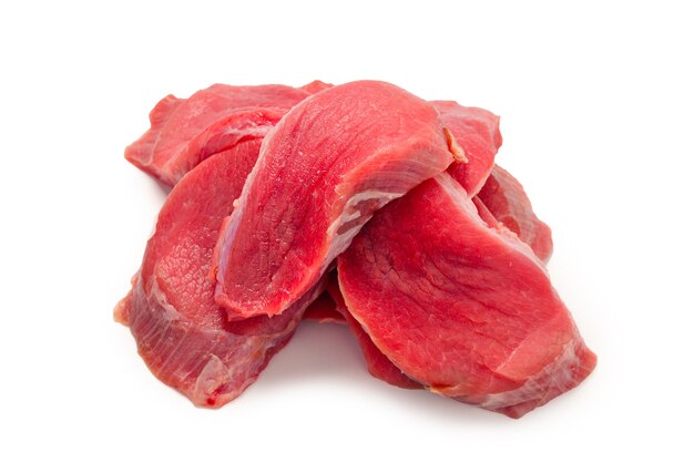 Veal pieces raw isolated on white