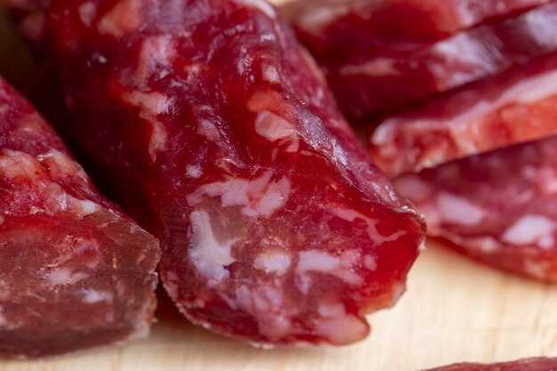 Veal sausage on the table during cooking highquality dehydrated veal sausage with spices and salt