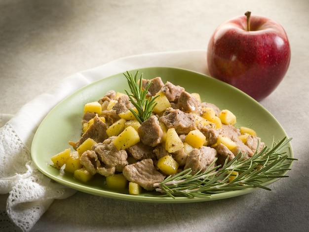 Veal stew with apple and rosemary