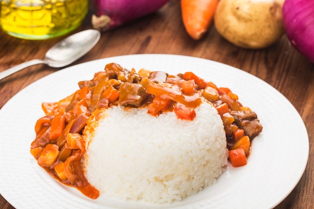 Veal stewed with vegetables and rice