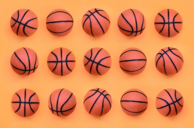 Veel kleine oranje ballen voor basketbal sportgame leugens