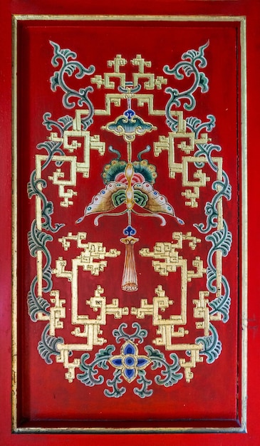 Veelkleurig Aziatisch ornament op muur