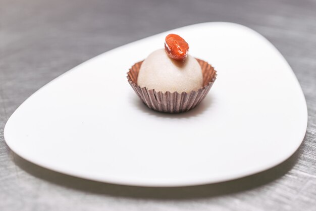 Vegan almond ball dessert, with goji seed