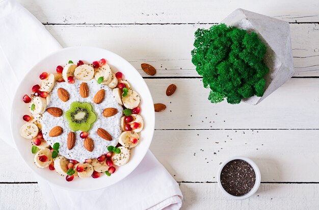 Vegan almond milk chia seeds pudding  with banana and kiwi