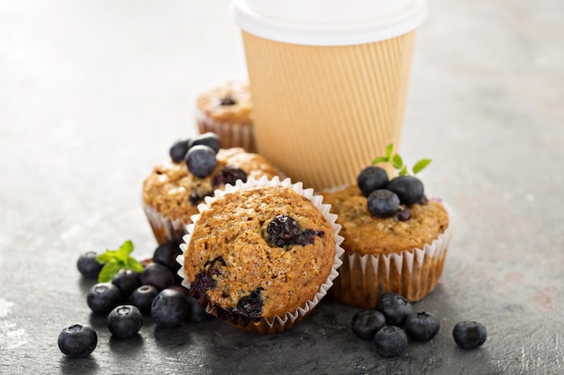 Vegan banana blueberry muffins with coffee to go