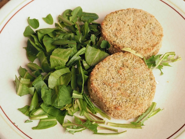 Vegan burger with salad