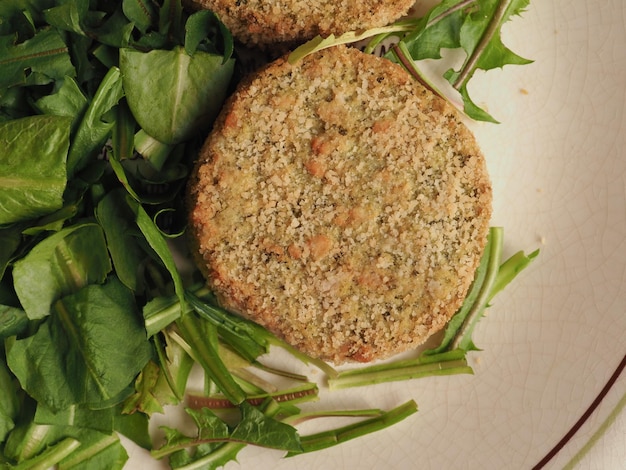 Vegan burger with salad