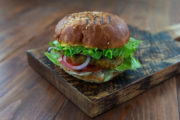 Vegan burger on a wooden board