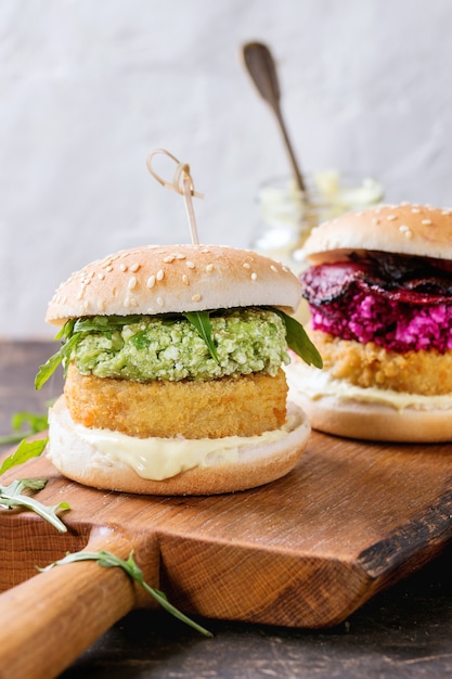 Vegan burgers with avocado, beetroot and sauce