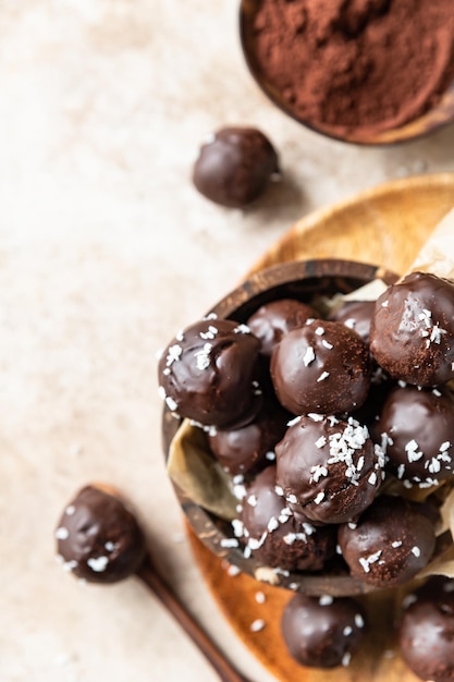Vegan chickpea and peanut butter candies in chocolate glaze Healthy raw dessert without sugar