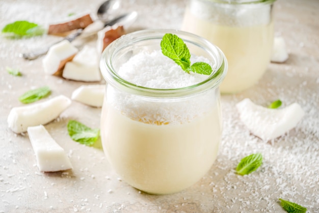 Vegan coconut panna cotta dessert in glass jar