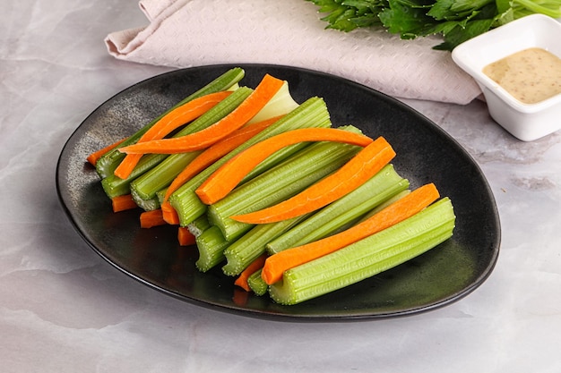 Vegan cuisine dietary celery and carrot cticks snack