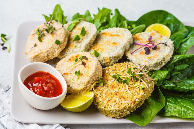 Vegan cutlets (burgers) of lentils, chickpeas and beans. Healthy vegan food concept, detox dish, plant based diet.