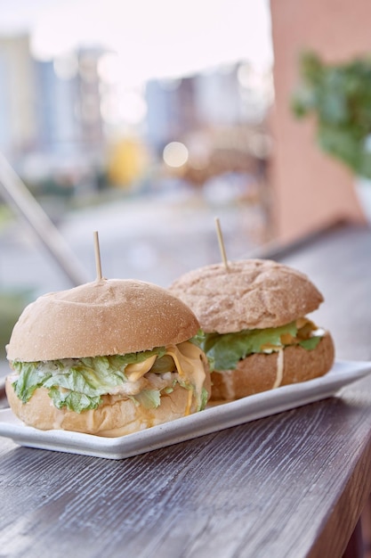 Vegan homemade burgers with vegetable cutlet and greens