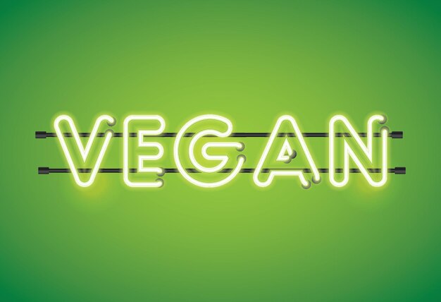 Vegan neon TL-verlichting bericht op een groene achtergrond