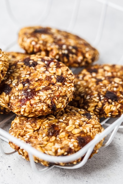 Vegan oatmeal cookies with sesame. Healthy vegetarian food concept.