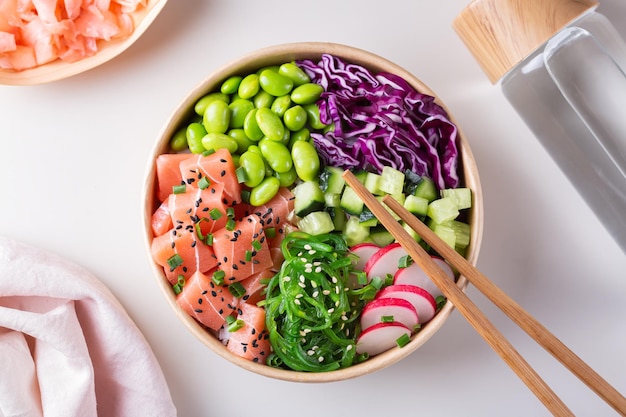 Vegan poke bowl with plant based tuna wakame and edamame