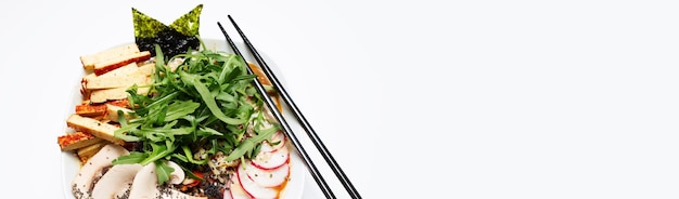 Vegan ramen noodles miso soup on white background with copy space