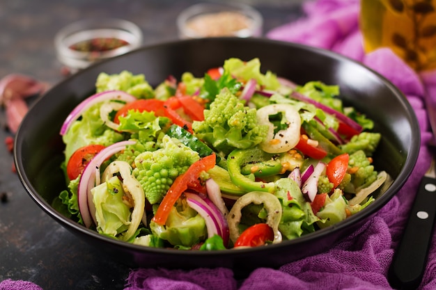 Vegan salad of fresh vegetables and cabbage romanesko. Dietary menu. Proper nutrition