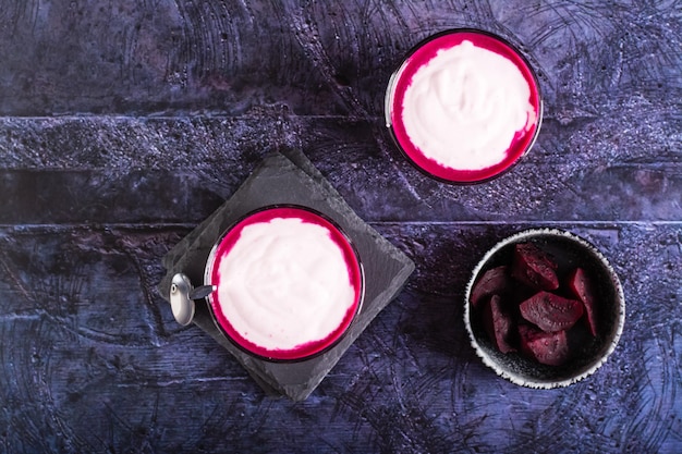 Vegetable beetroot latte in glasses on the table Coffee alternative Top view