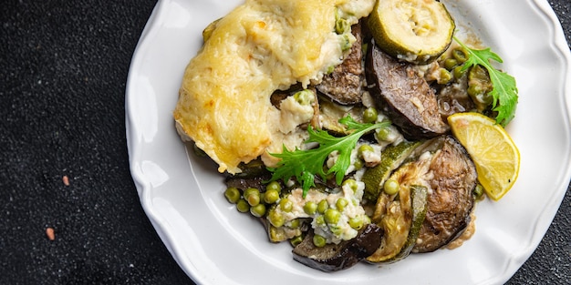 vegetable casserole eggplant, zucchini, green peas, cheese, bechamel sauce vegetables lasagne meal