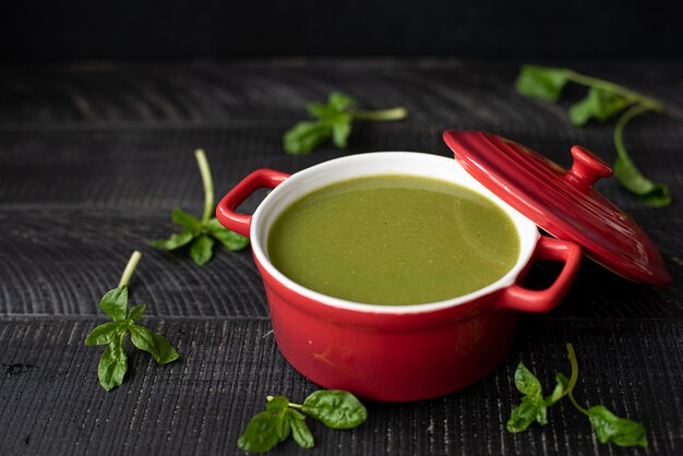 Vegetable cream soup with spinach, broccoli and seeds