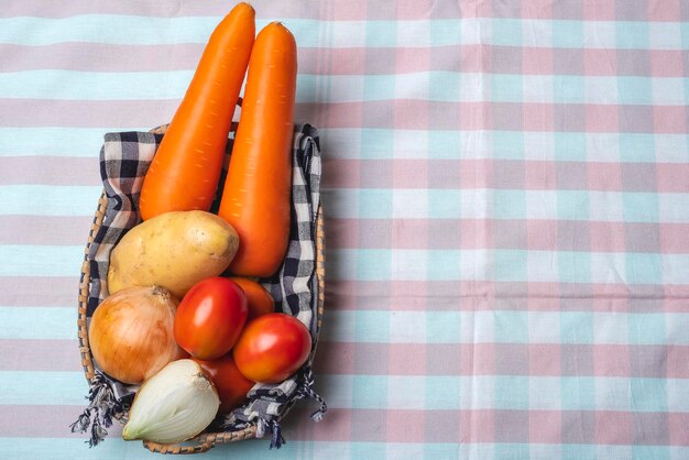 Vegetable and fruit set for boiling soup and cooking in a wooden basket