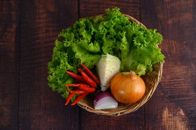 Vegetable and Ingredient herb for cooking salad in wicker basket