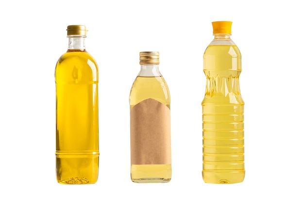Фото Растительное масло с оливковым маслом в другой бутылке для приготовления пищи на белом фоне с вырезкой