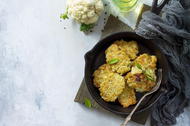 Vegetable pancakes on stone or slate background Fried vegetarian cutlets or pancakes