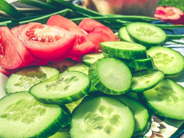 Vegetable plate Cucumbers and tomatoes are cut into thin circles dietary fiber gut health food salad