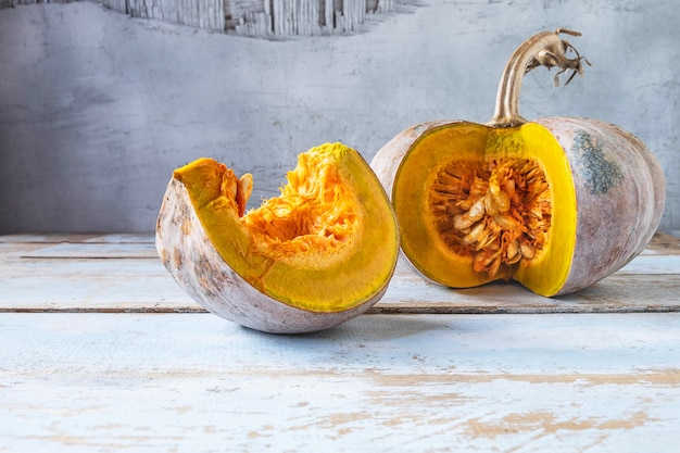 Vegetable pumpkin on a wooden table