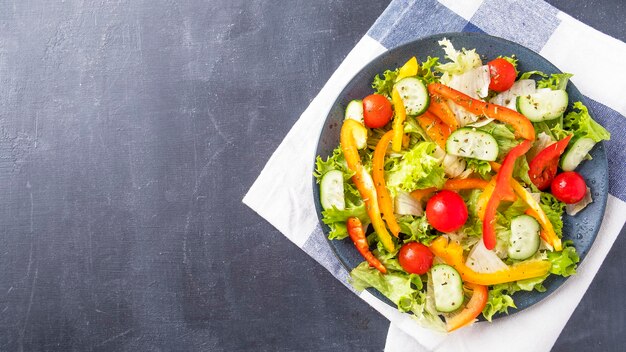 Vegetable salad on a plate Top view copy space