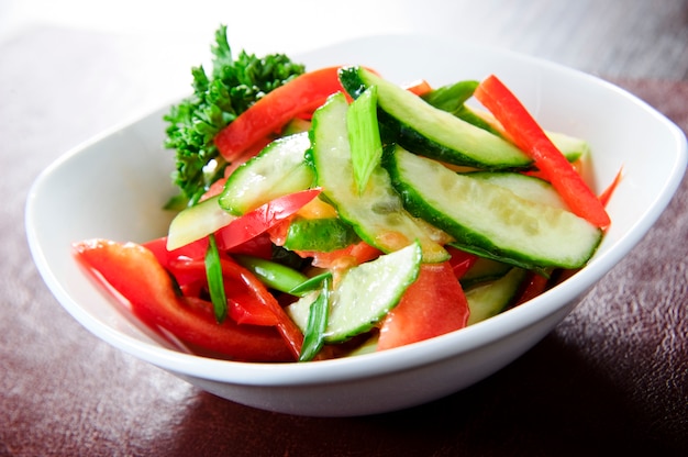 Vegetable salad on white plate