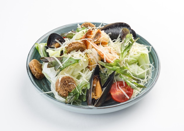 Vegetable salad with cheese and mussels