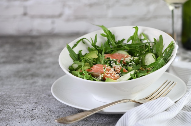 Vegetable salad with red fish