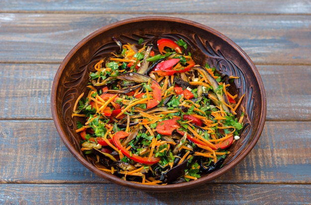 Vegetable salad in wooden bowl