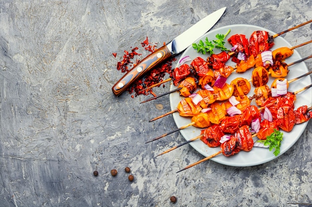 Vegetable skewers of tomatoes, cherry tomatoes on skewers.Copy space