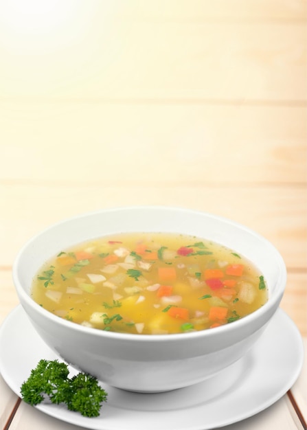 Vegetable soup isolated on a white background