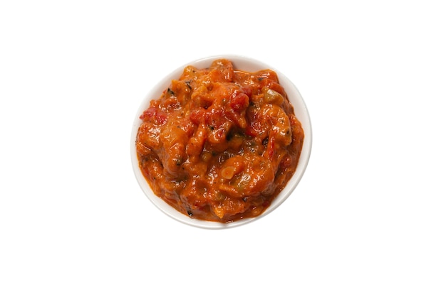 Vegetable stew in a bowl isolated on white background.